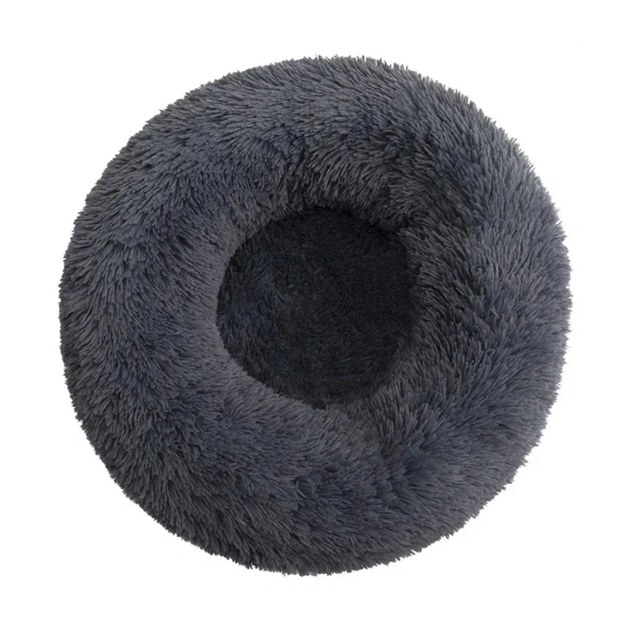 Fluffy gray pet bed on a white background