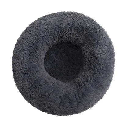 Fluffy gray pet bed on a white background